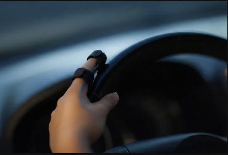 Detection response task switch worn on the finger while driving